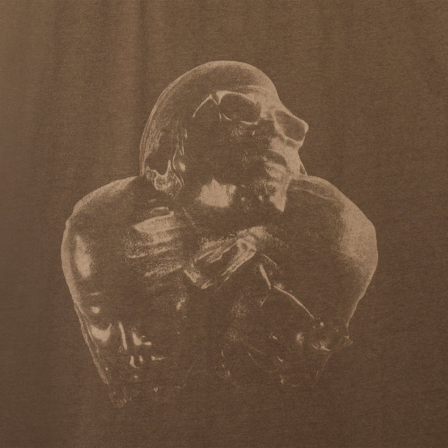 Close-up of PHOLKS Tee front graphic with washed, tonal Leon Thomas artwork
