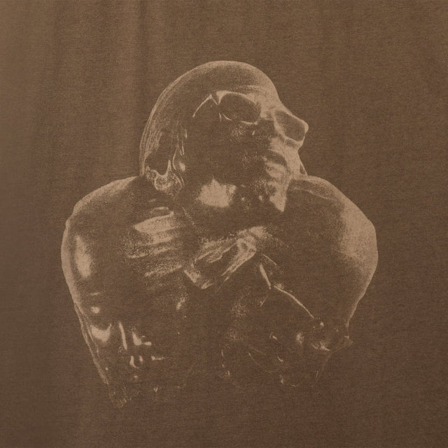 Close-up of PHOLKS Tee front graphic with washed, tonal Leon Thomas artwork