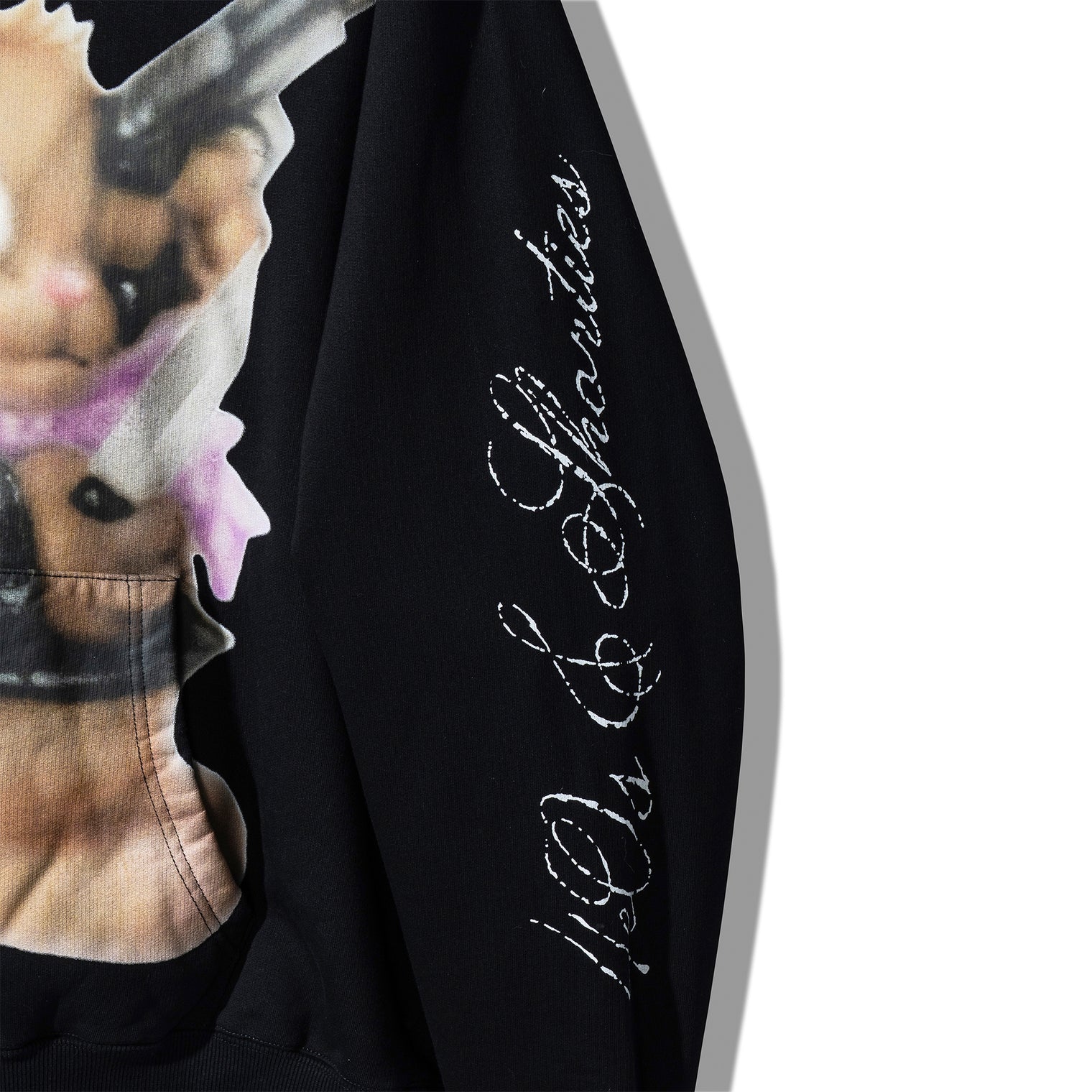 Side view of Psycho Bunny Hoodie – 40s & Shorties printed branding on sleeve in white script