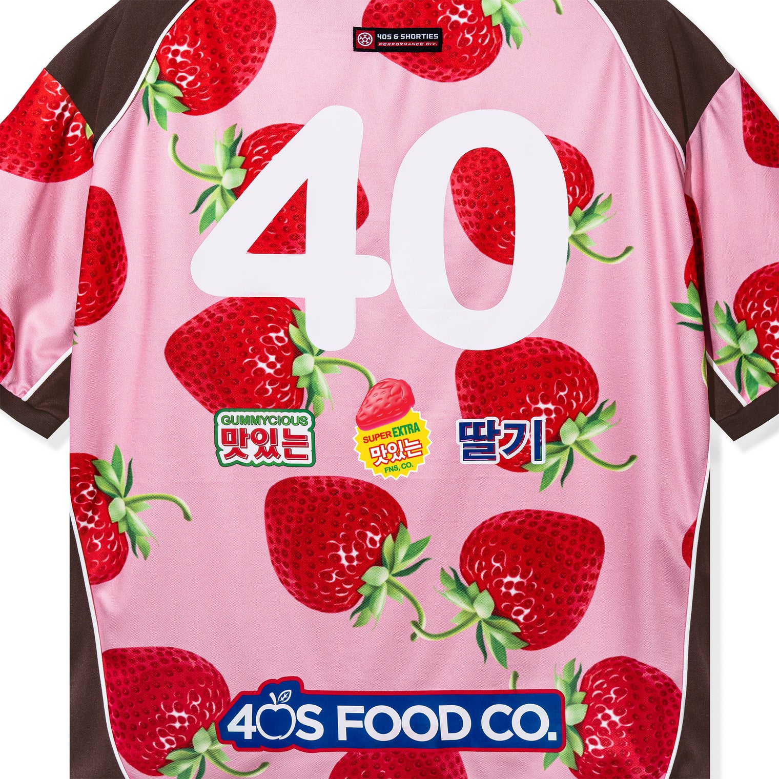 Close-up of the back graphics showing strawberry details and brand logos