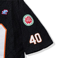 Right sleeve detail with rose embroidery and tackle-twill “40”