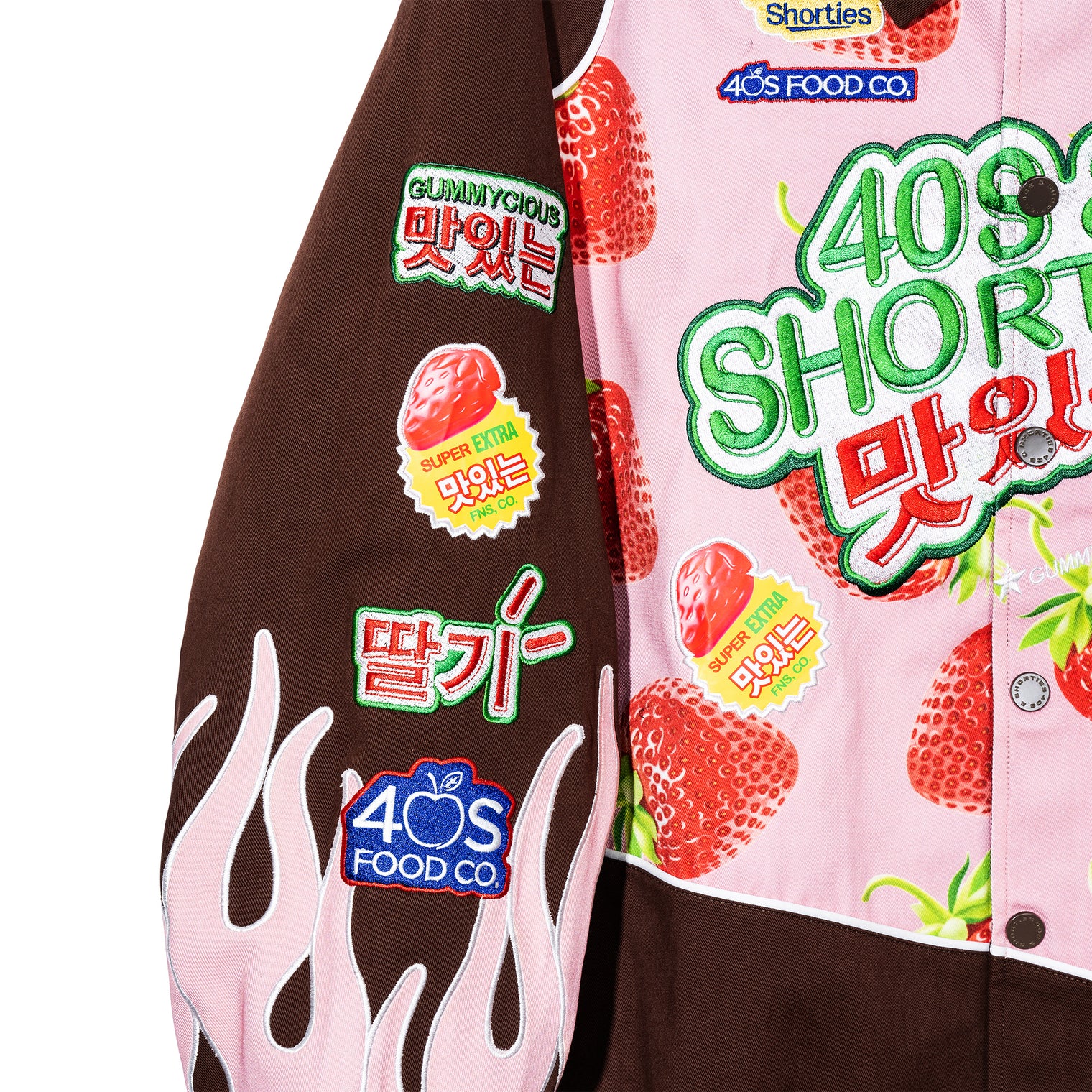 Right sleeve of the Gummy Race Jacket showcasing flame embroidery and strawberry patch details