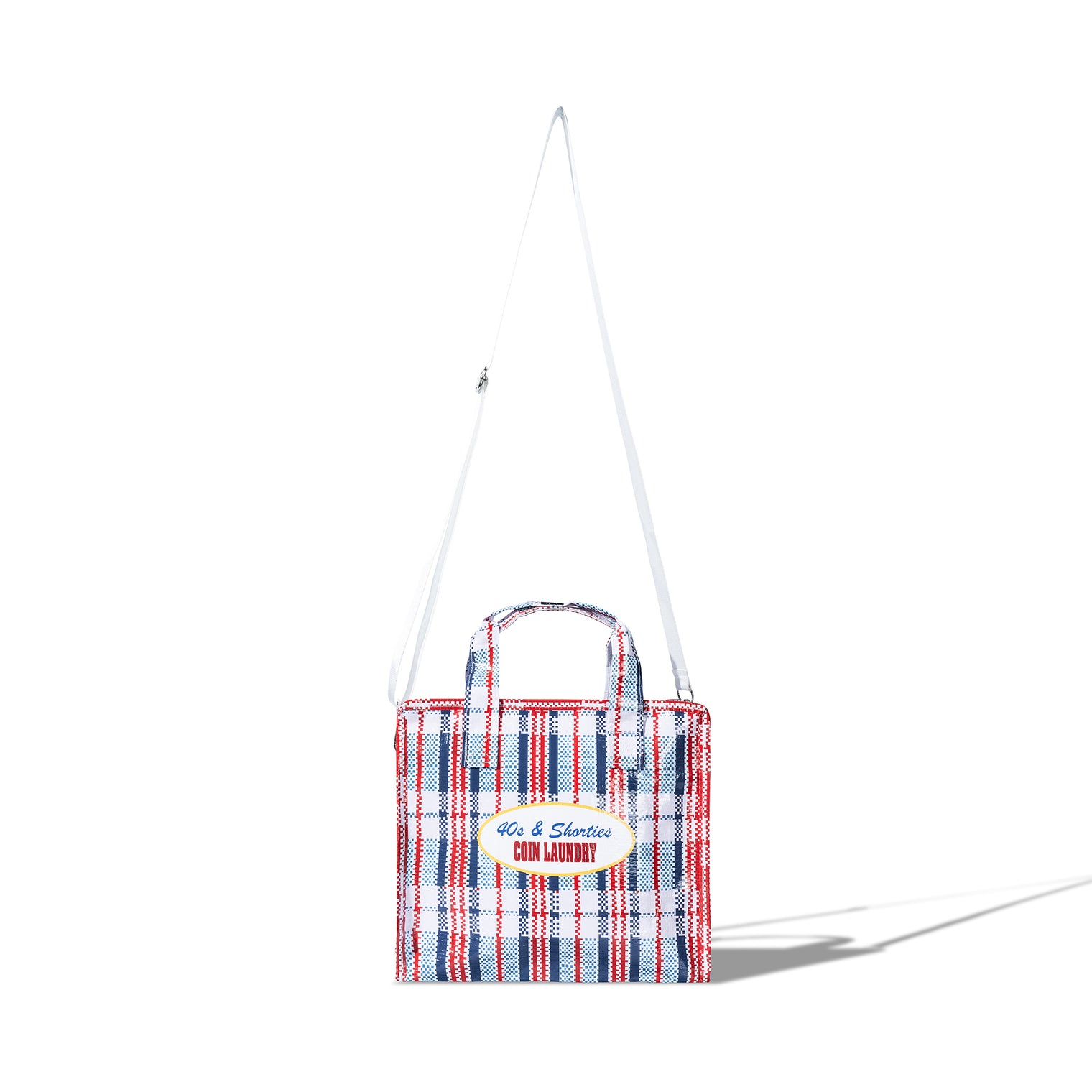 Back view of the Mini Laundry Bag in multi-color plaid with matching top handles and shoulder strap