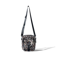 Front view of the 40s & Shorties Reed Camo Side Bag with buckle closure and patch details