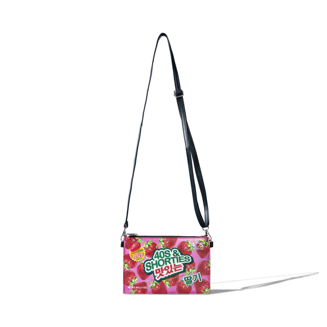 Front view of 40s & Shorties Gummy Zip Pouch in Pink with strawberry candy-inspired artwork and Korean script