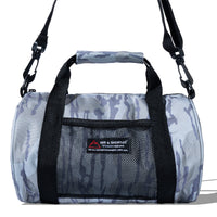 Close-up of Camo Mini Duffle Bag showing mesh pocket and 40s & Shorties branding