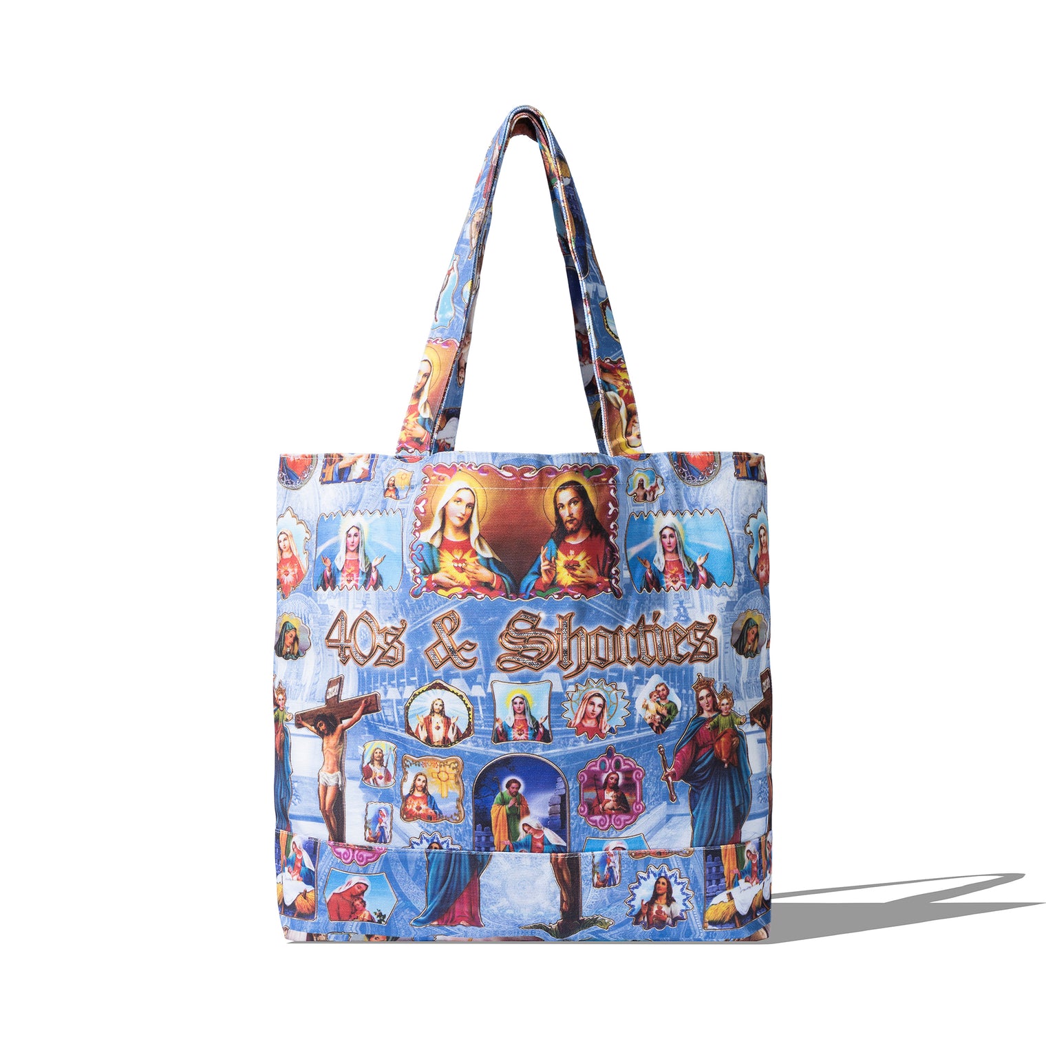Back view of the Holy Spirit Tote Bag in blue, featuring large sublimated religious graphics and ornate 40s & Shorties logo embroidery.