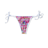 Front view of Holy Spirit Bikini bottom with pink religious print and white tie sides