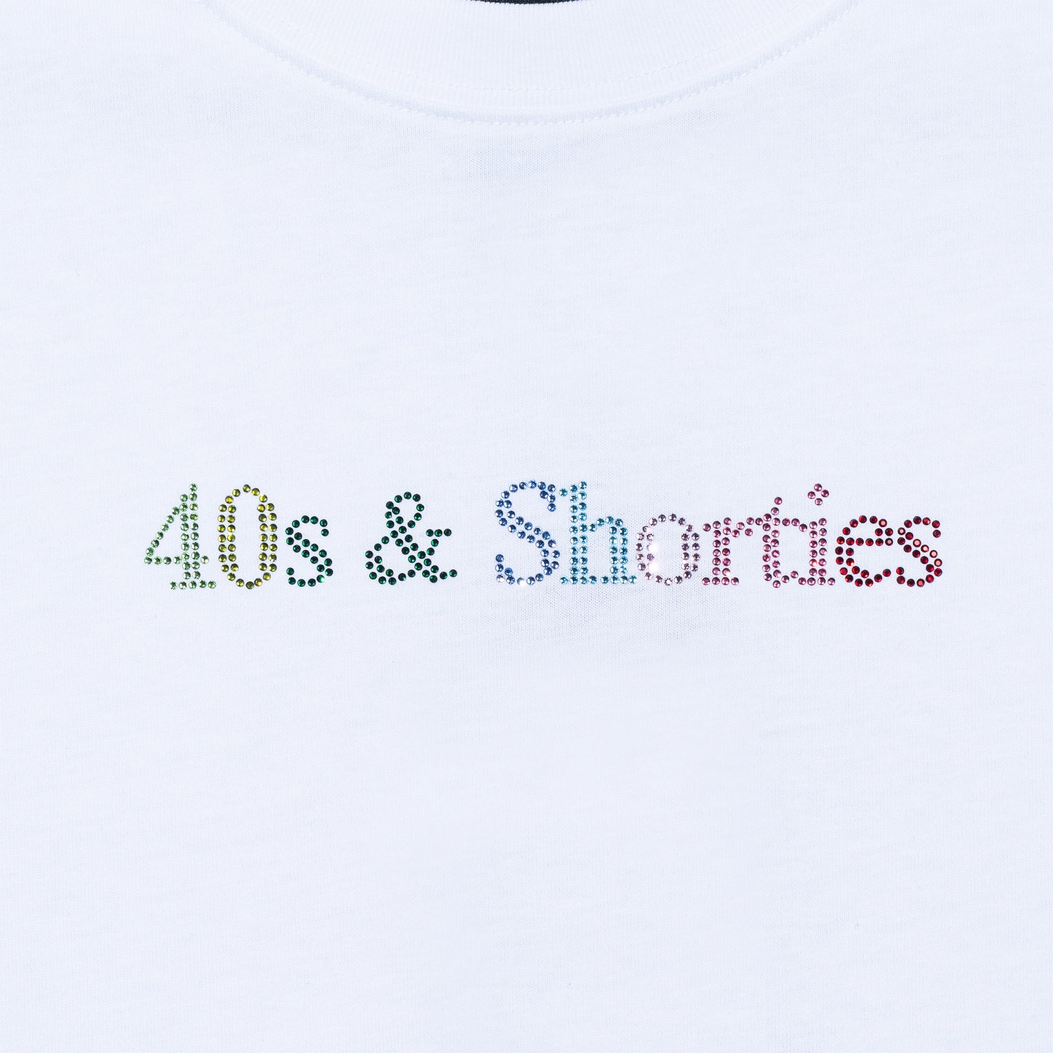 Close-up of multicolor rhinestone "40s & Shorties" logo on white tee.