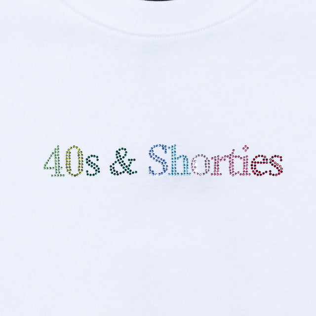 Close-up of multicolor rhinestone "40s & Shorties" logo on white tee.
