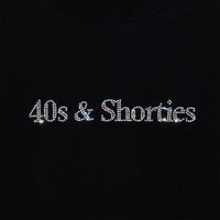 Close-up of clear rhinestone 40s & Shorties text detail.