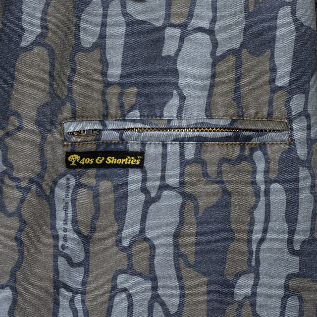 Zipper chest pocket with 40s & Shorties woven label on Treeline Jacket