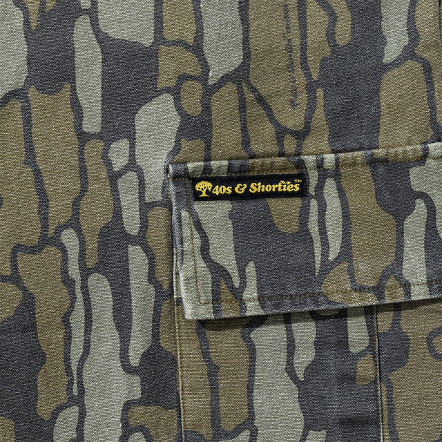 Close-up of cargo pocket with yellow 40s & Shorties woven label