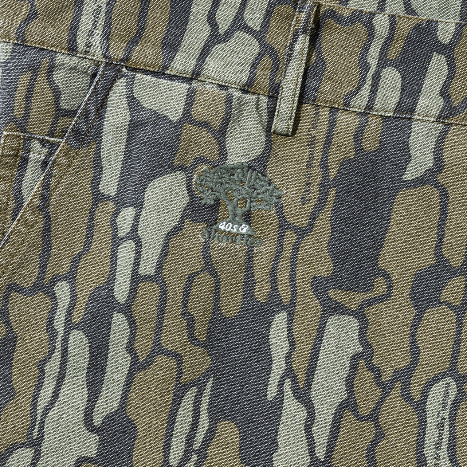 Detail of hip embroidery logo on Treeline Cargo Pants