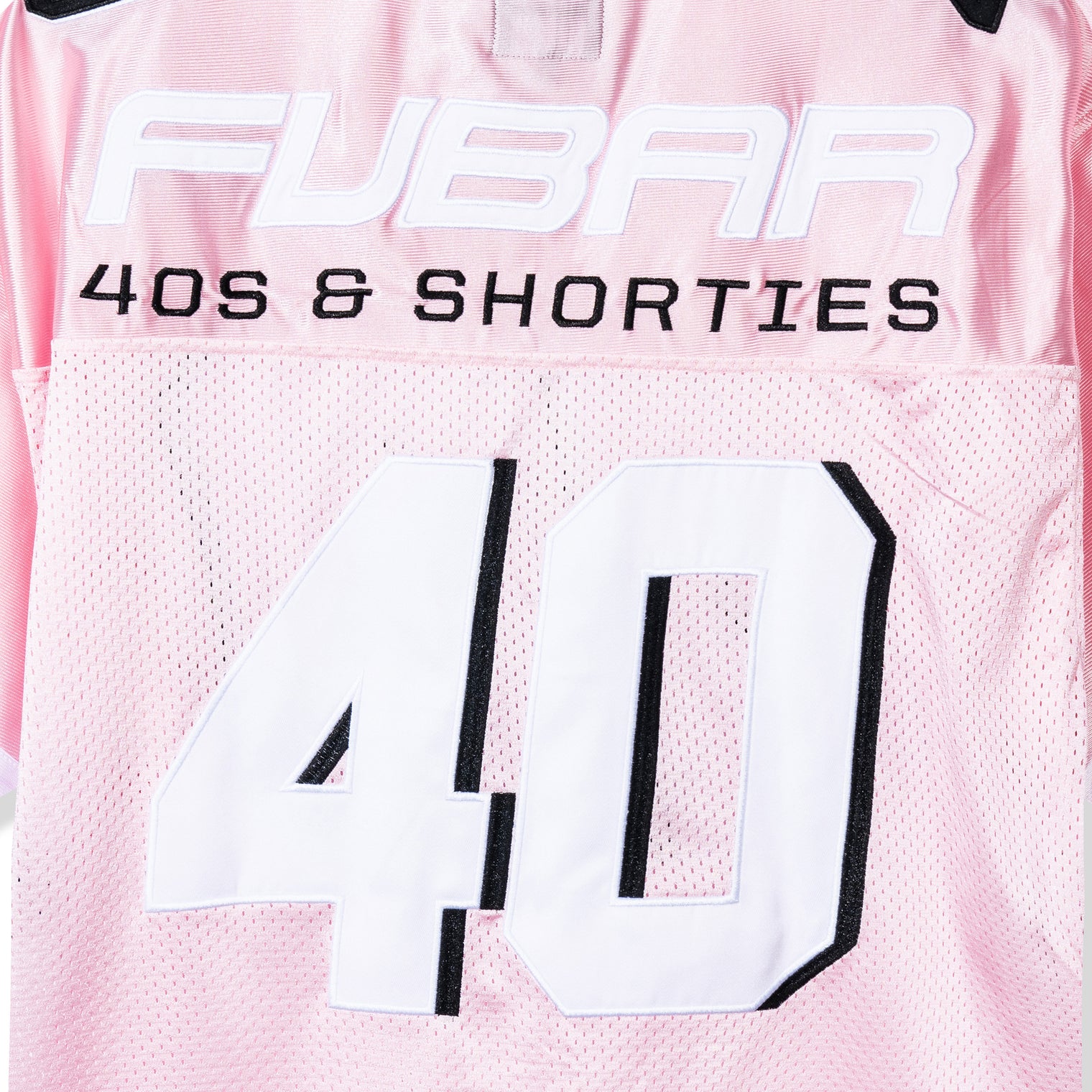 Close-up of the back “FUBAR” and “40s & Shorties” embroidery and appliqué on the Fubar Jersey in Pink.