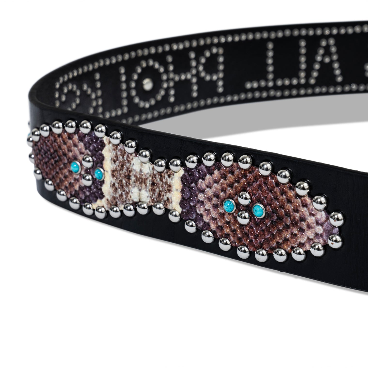 Zoomed-in view of snake-pattern vinyl applique with turquoise studs on black leather belt