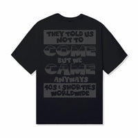 Full back view of the Charge It Tee showing oversized text print.