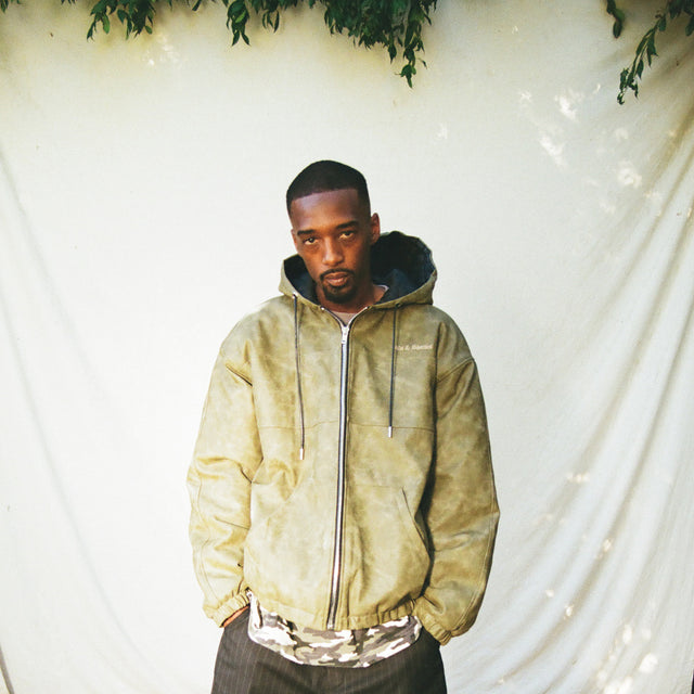 Model front view wearing Damien Zip Hoodie – Brown