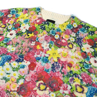 Close-up of the 40s & Shorties Flower Collage Sweater showing detailed digital floral print and white embroidered chest logo.