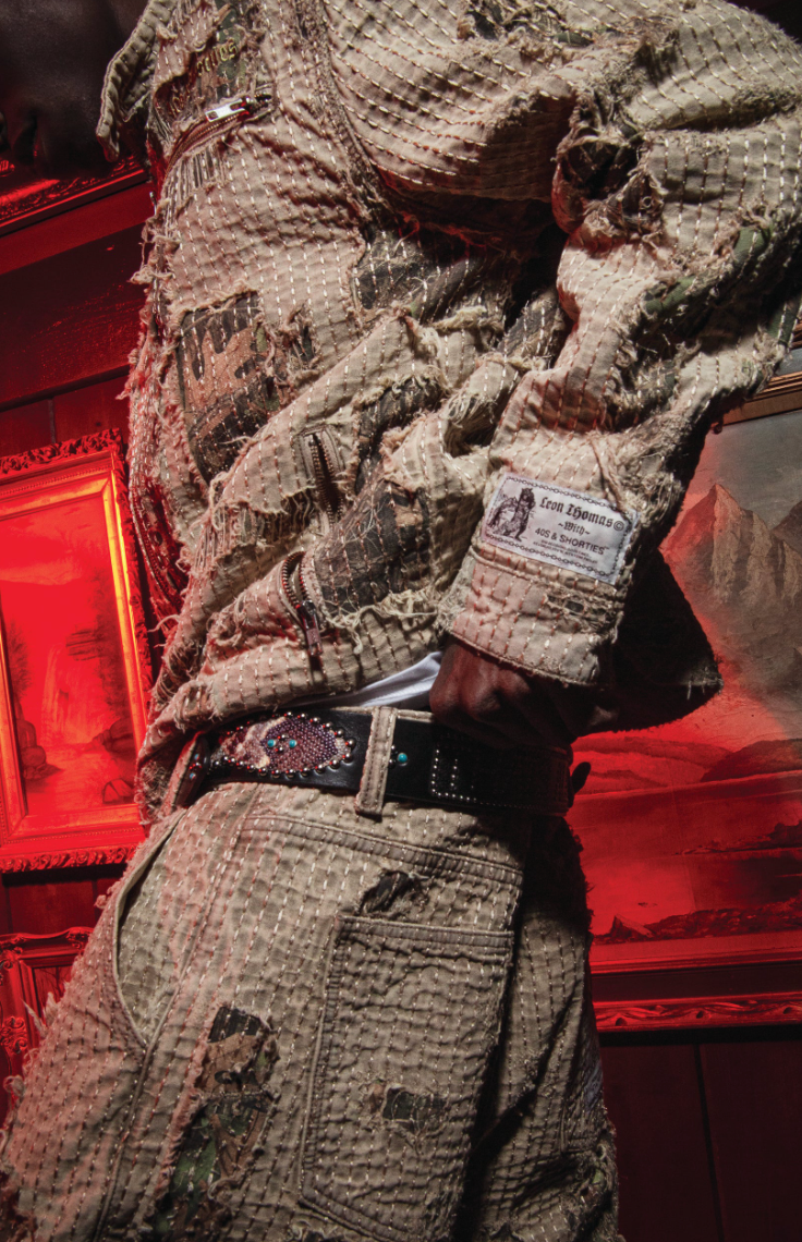 Model wearing matching Boro Jacket and Boro Pants set showing distressed stitching and woven label