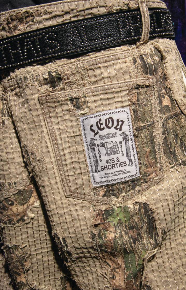 Boro Pants pocket close-up with Leon Thomas x 40s & Shorties woven label, distressed boro stitching, and Leon Thomas Snakeskin Belt