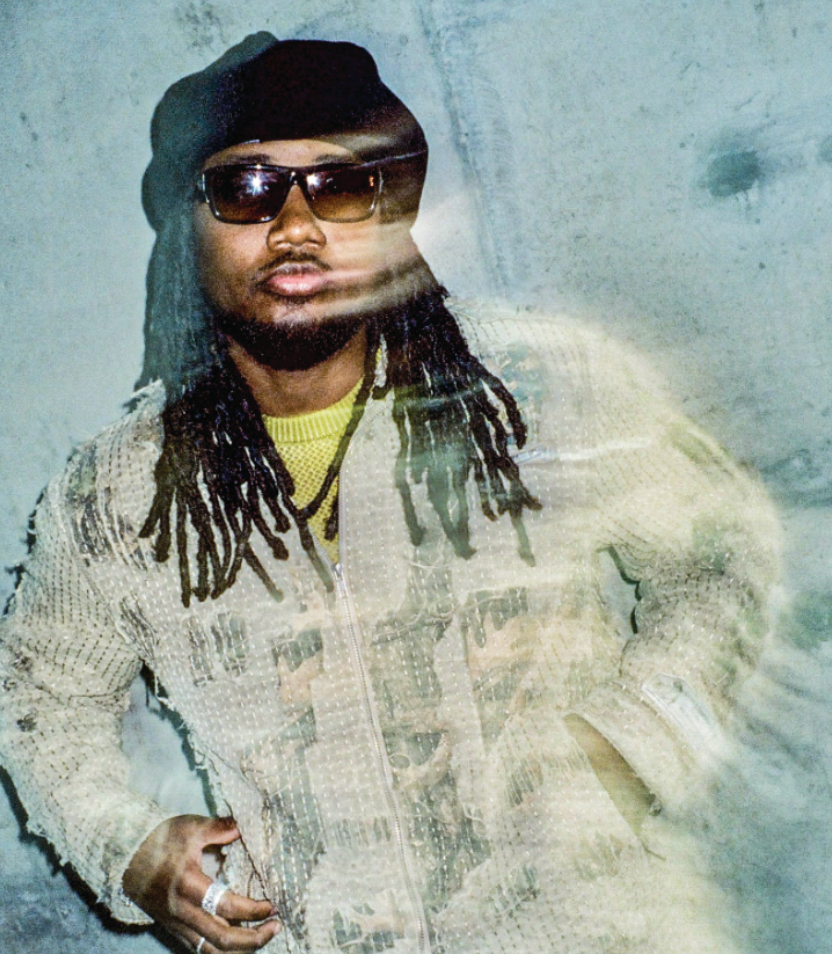 Model portrait wearing Boro Jacket styled with sunglasses and beanie