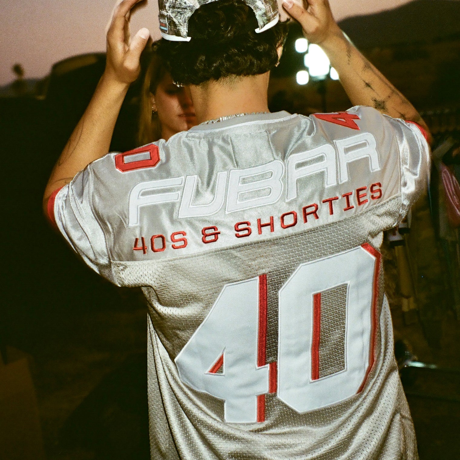 Model showing back view of Fubar Jersey in Grey with “FUBAR” and “40” appliqué visible.