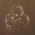 Close-up of PHOLKS Tee front graphic with washed, tonal Leon Thomas artwork
