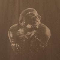 Close-up of PHOLKS Tee front graphic with washed, tonal Leon Thomas artwork

