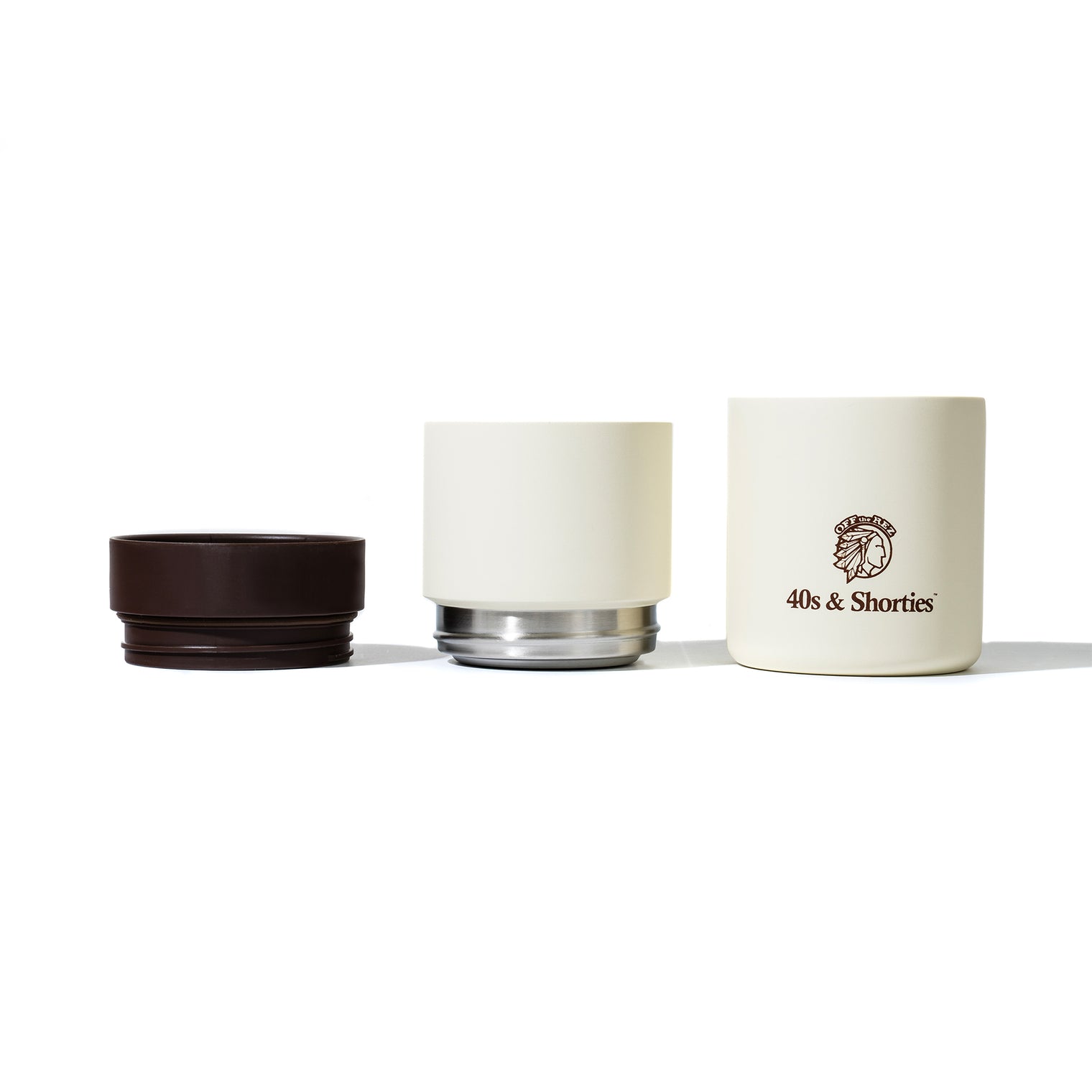 A deconstructed view of the 40s & Shorties Coffee Pour Over Set in cream and brown, showcasing the lid, dripper, and main body of the container side by side.

