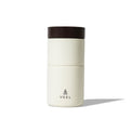 The assembled Coffee Pour Over Set featuring the VSSL logo on the front of the matte cream exterior with brown lid.