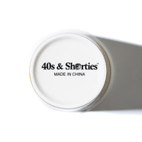 Bottom of the Ceramic Coffee Cup with black 40s & Shorties logo and “Made in China” text printed on the white ceramic base.