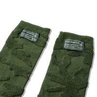 Close-up of 40s & Shorties Shag Socks Olive – textured knit with woven logo patch