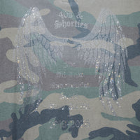 Detail view of rhinestone angel wings and tribute message on back of Angel Wings Tee in Camo