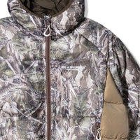 Close-up of 40s & Shorties Faded Camo Puffer Jacket – printed chest logo on camo fabric