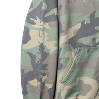 Detail of Angel Wings Hoodie – rhinestone embellishment on camo sleeve