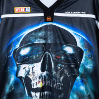 Close-up of skull artwork on the Tales Hockey Jersey chest with glowing eyes and space-inspired details.