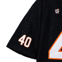 Left sleeve detail with tackle-twill “40” and embroidered mascot
