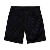 Back view of black pinstripe shorts with welt pockets and 40s & Shorties woven label above the pocket
