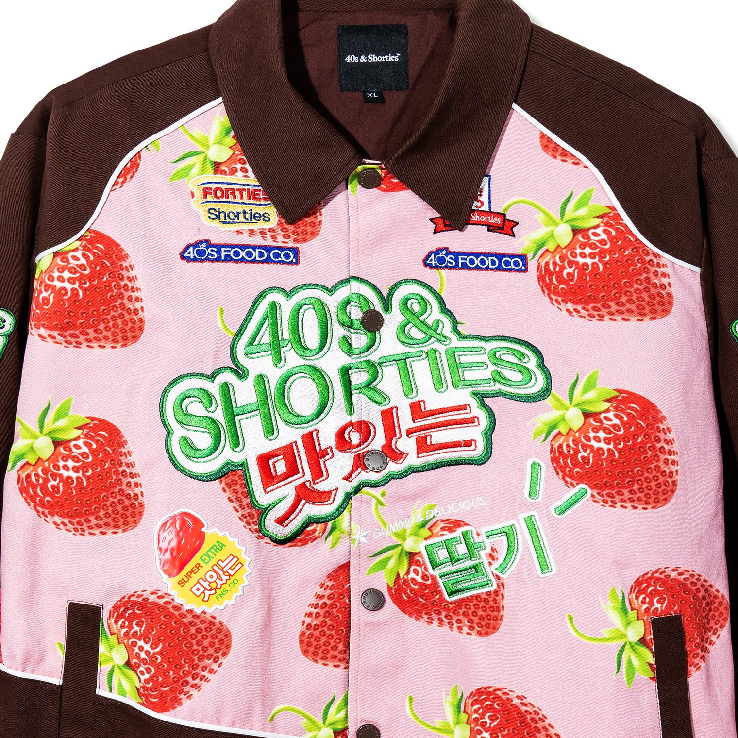 Close-up of chest embroidery on the Gummy Race Jacket featuring 40s & Shorties logo and Korean lettering