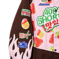 Right sleeve of the Gummy Race Jacket showcasing flame embroidery and strawberry patch details