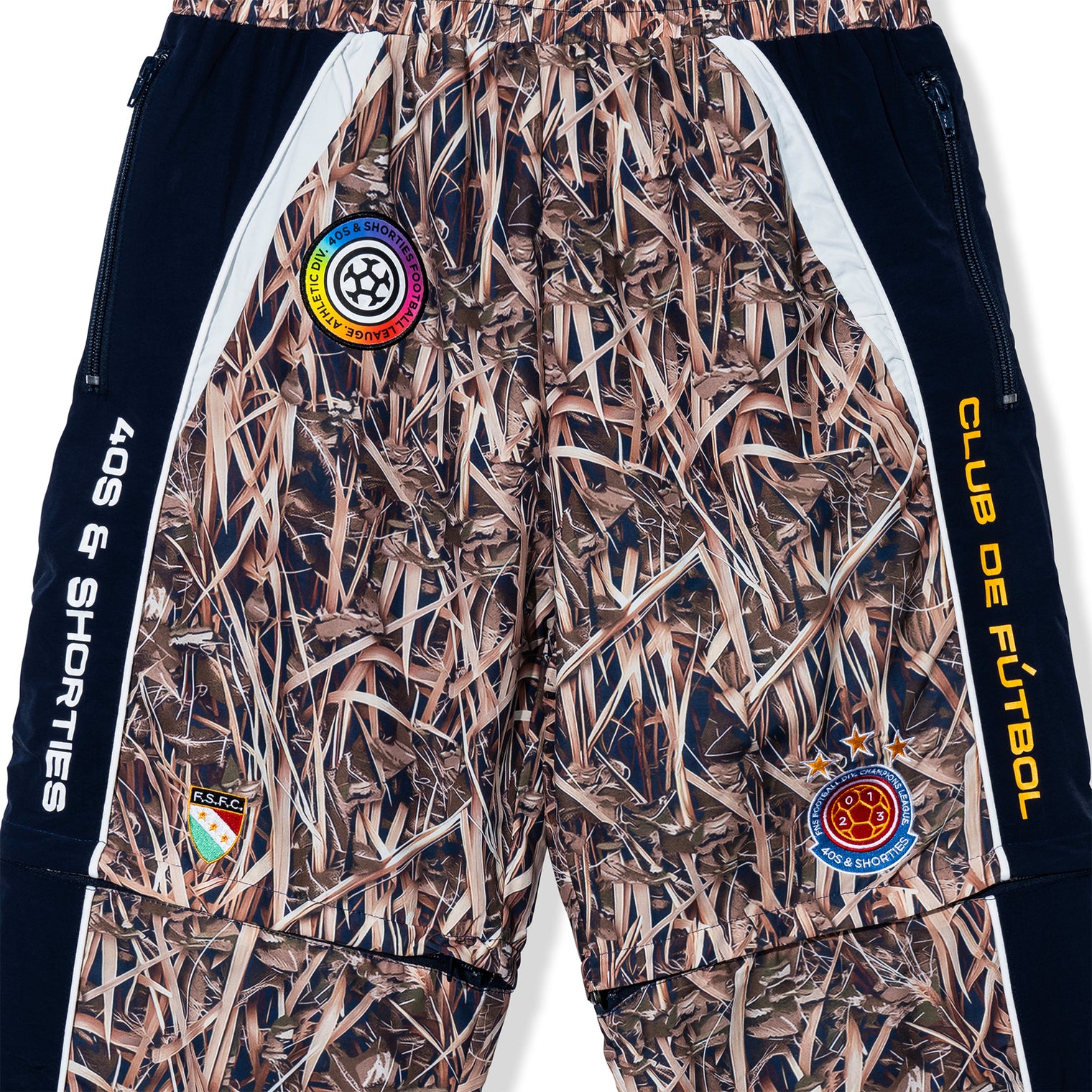 Close-up of front upper half showing patches and side panel prints