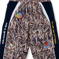 Close-up of front upper half showing patches and side panel prints