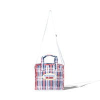 Front view of the Mini Laundry Bag in red, white, and blue plaid with 40s & Shorties Coin Laundry patch
