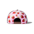 Rear view of Gummy Race Cap showing pink strawberry print and adjustable brown snapback closure.
