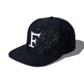 Crochet Snapback Black – angled side view showing lace texture and front embroidery