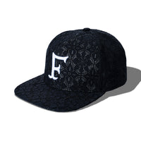 Crochet Snapback Black – angled side view showing lace texture and front embroidery