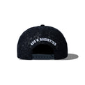 Crochet Snapback Black – back view showing embroidered "40s & Shorties" above snap closure
