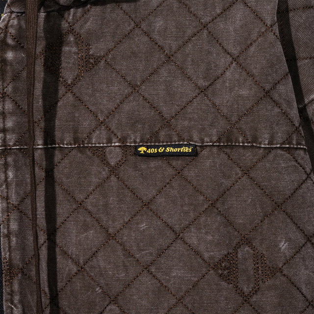 Close-up of 40s & Shorties woven label on the Foreman Hooded Jacket
