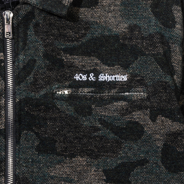 Close-up of chest embroidery and zip pocket on Wool Camo Jacket
